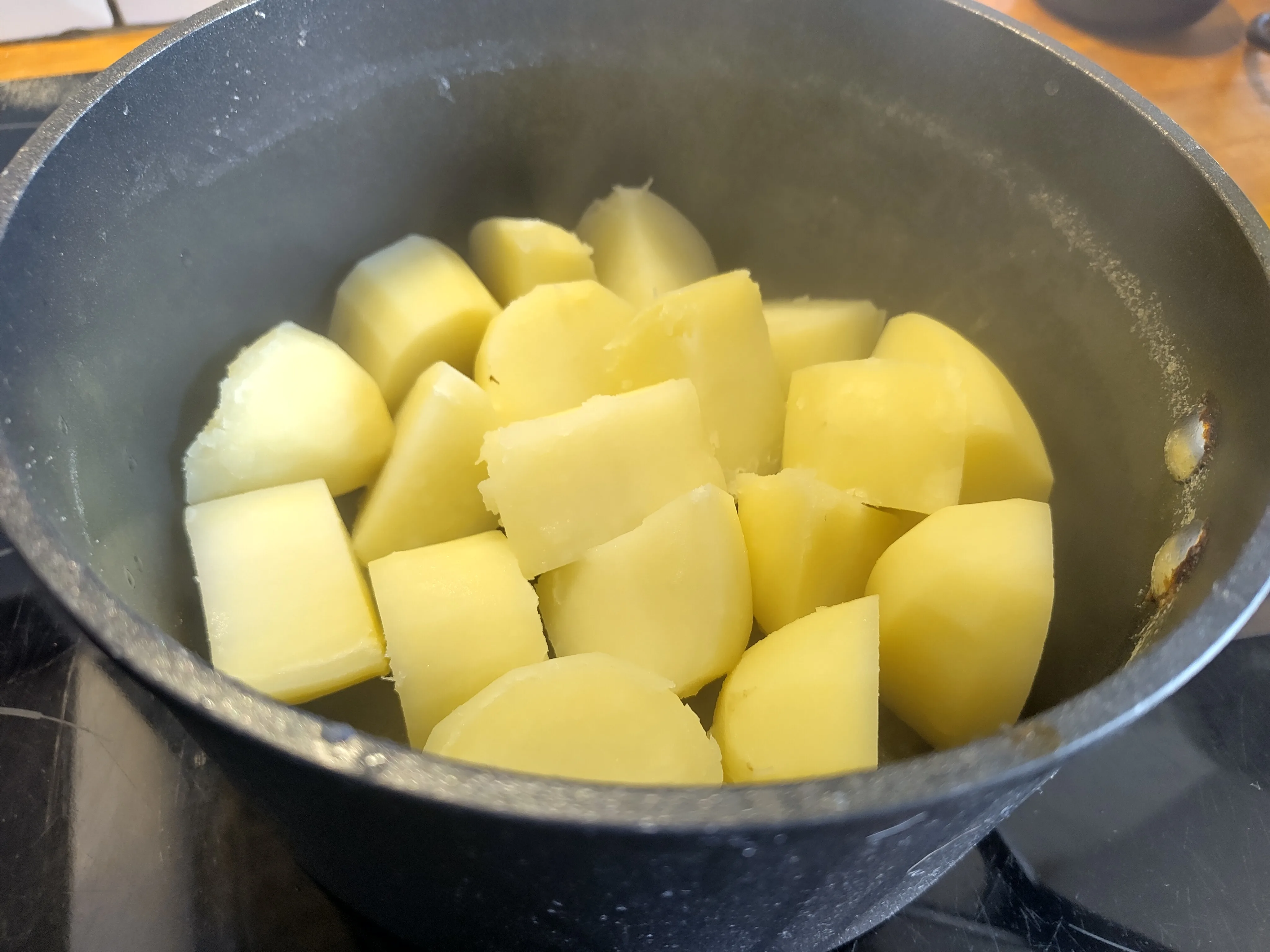 Potatoes drying in a hot pan