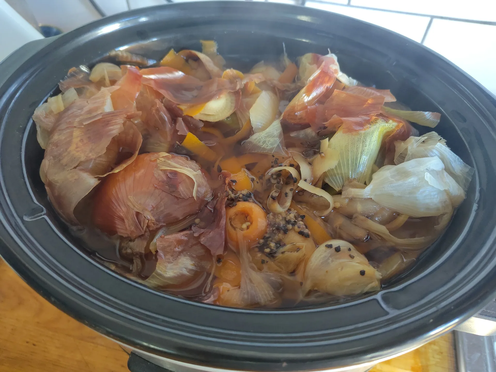 Vegetable stock cooked, ready to filter